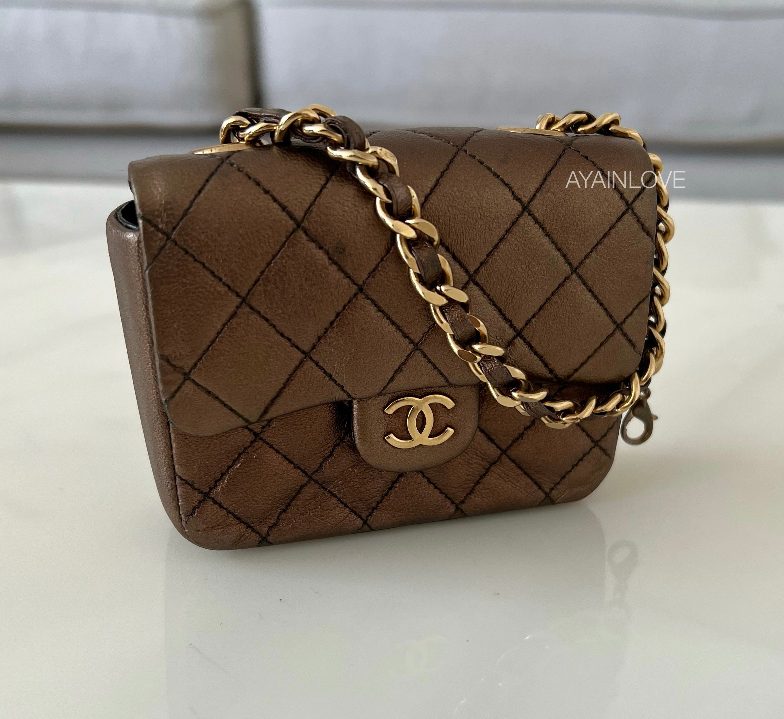 CHANEL Vintage 1997-1999 Mini Bronze Flap Pouch Bag Charm 24K Gold Pla –  AYAINLOVE CURATED LUXURIES